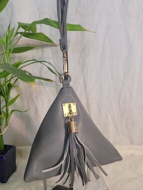 Gray Tassel Pyramid Wristlet Clutch with Gold Accent